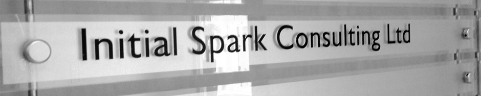 The Initial Spark Consulting plaque.